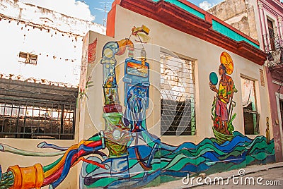 Unusual graffiti on the house, drawing on the wall: sewer pipes, water, man. Havana. Cuba Editorial Stock Photo