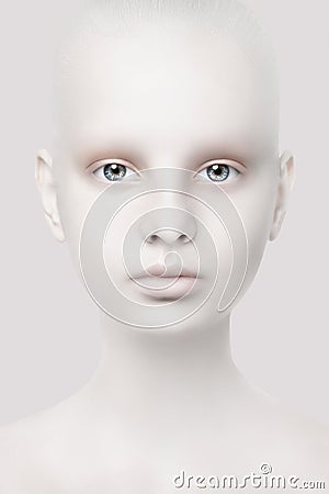Unusual portrait of a young girl. Fantastic appearance. White skin. Head close-up. Stock Photo