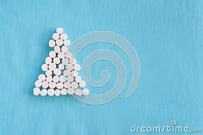 Unusual tree. Blue background. White marshmallows Stock Photo