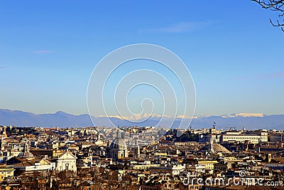 Unusual view of Roma Italy sourrounded by snowcapped mountains Stock Photo