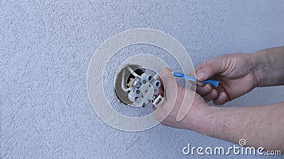 Installation of an energized outlet and copy space Stock Photo