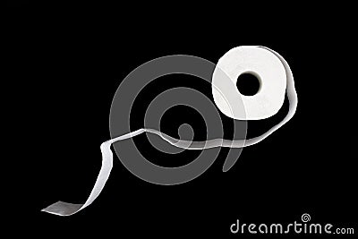 Unwound roll of toilet papaer isolated on black background Stock Photo