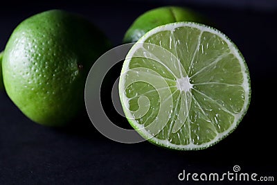 Up close lime slice in low light Stock Photo