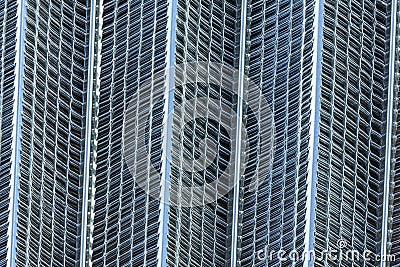 Up close metal mesh sheet blue silver coloring and angles Stock Photo
