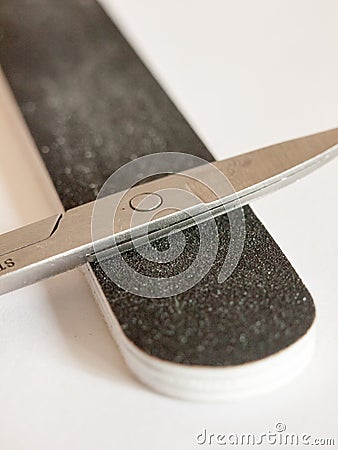 Up close nail file and scissors detail macro Stock Photo