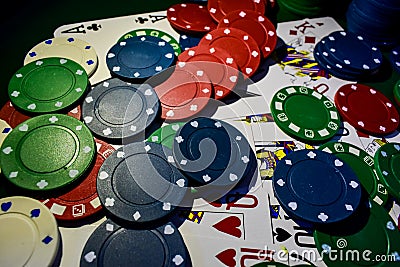 Up close photograph of playing cards and poker chips Stock Photo