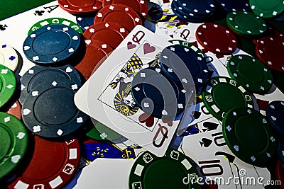 Up close photograph of playing cards and poker chips Stock Photo