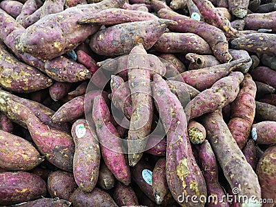 Up close a sweet potatoes for sell in the supermarket Stock Photo