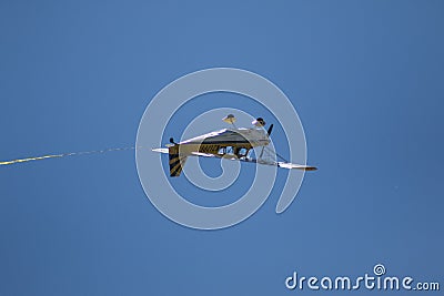 The Up-Side Down Airplane in the Air Editorial Stock Photo