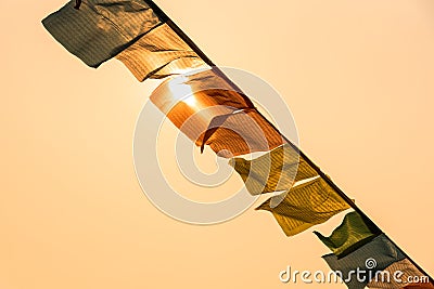 Up view Flag tibetan for the Buddha and sunlight Stock Photo