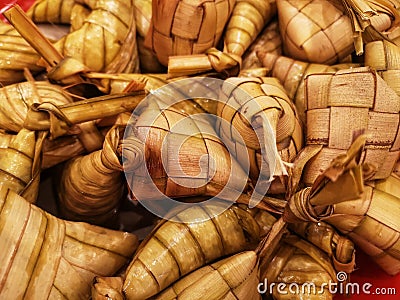 Upclose a dumpling rice or ketupat for celebration Selamat Hari Raya with selective focus Stock Photo