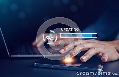 Update software system in computer. Man using smartphone upgrade program, Business technology internet loading virtual bar with Stock Photo