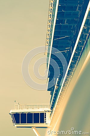 Upper captain deck on big luxury cruise view from balcony in sun Stock Photo