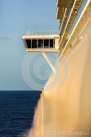 Upper captain deck on big luxury cruise view from balcony in sun Stock Photo