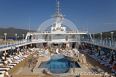 Upper deck swimming pool of Insignia Oceania Cruise ship as it cruises Mediterranean Ocean, Europe Editorial Stock Photo