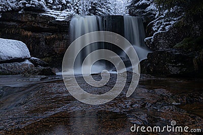 Upper waterfall of Jedlova in winter time Stock Photo