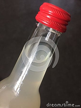 Upper part of a lemonade bottle Stock Photo