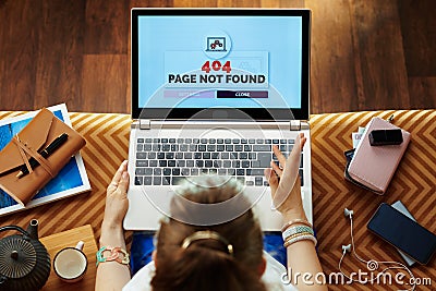 Unhappy modern woman having 404 page not found error on laptop Stock Photo