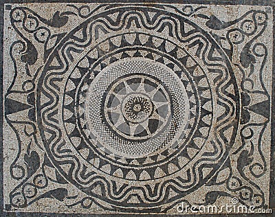 Uprising sun on Mosaic in Roman villa Stock Photo