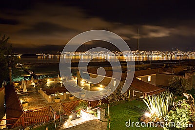 Upscale hotel and Inviting Courtyard and garden at night on Titikaka, Peru in South America Stock Photo