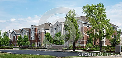 Upscale Red Brick and Tan Apartment Buildings Stock Photo