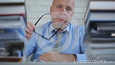 Upset and Amazed Businessman In Blurred Image Working In Accounting Office Stock Photo