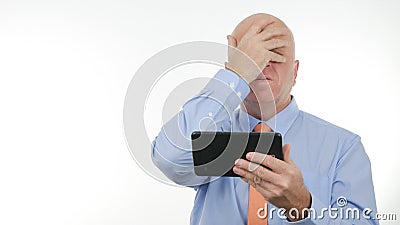 Upset Businessperson Read Bad News on Tablet and Make Nervous Hand Gestures Stock Photo