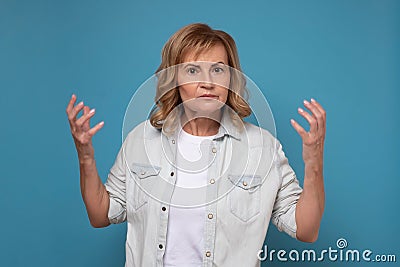 Upset caucasian woman being puzzled asking what do you want form me. Stock Photo