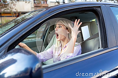 Upset driver caught in unpleasant situation Stock Photo