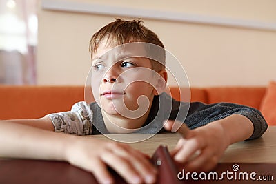 Upset hungry child waiting food Stock Photo