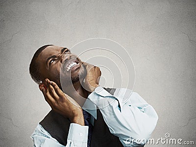 Upset man asking neighbor to stop making loud noise Stock Photo