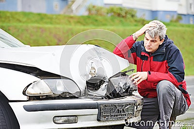 Upset man after car crash Stock Photo