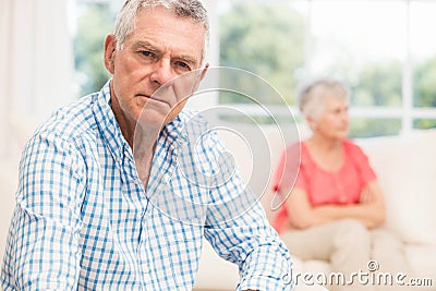 Upset senior man after arguing with wife Stock Photo