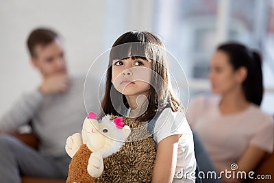 Upset small girl feel lonely suffer from family problems Stock Photo