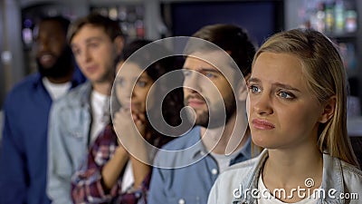 Upset team supporters watching championship online, rooting for goal competition Stock Photo