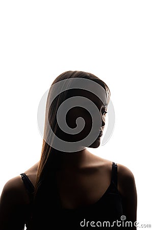 Upset woman backlit silhouette insecure woman face Stock Photo