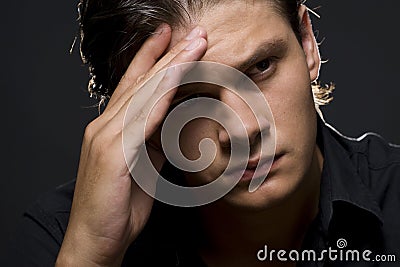 Upset young man Stock Photo