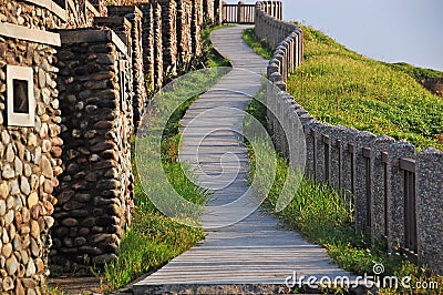 An upslope path to a sea shore hill at Hoping island, Keelung, Taiwan Stock Photo