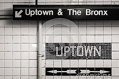 Uptown and The Bronx sign in a subway station in Manhattan, New York City Stock Photo