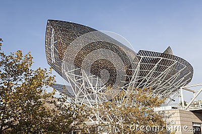 Urban art, sculpture, The Fish or Peix by Frank Gehry. Maritime promenade of Barceloneta beach, Barcelona. Editorial Stock Photo