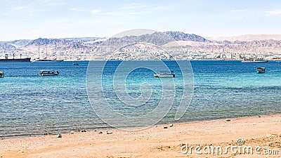 Urban beach of Aqaba and view of Eilat city Editorial Stock Photo