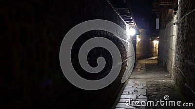 urban city stone pavement alley at night Stock Photo