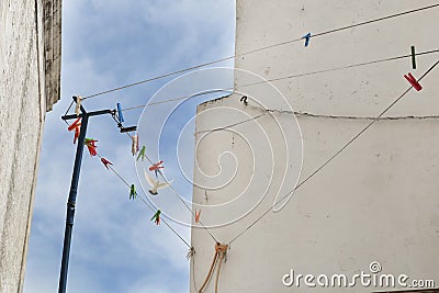Urban detail. White walls and blue sky. Stock Photo