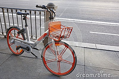 Urban electric battery bikes in the city. Sustainable mobility Stock Photo