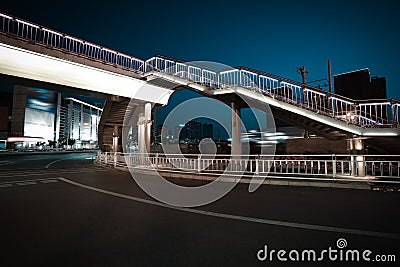Urban footbridge and road intersection of night scene Stock Photo