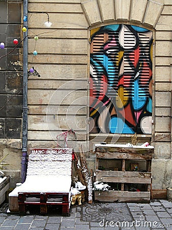 Urban furniture, public bench under the snow. Stock Photo