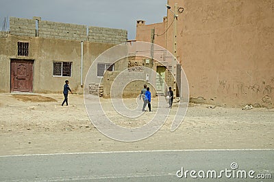 Urban life, shops and workshops, markets and common life in the streets of Morocco. People walking around Editorial Stock Photo