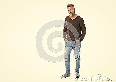 urban mature man with trendy menswear for everyday life, banner. handsome man in a casual menswear in studio. well Stock Photo