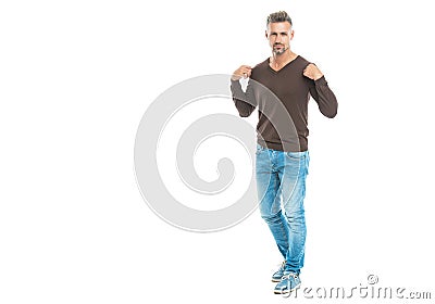 urban mature man with trendy menswear for everyday life. handsome man in a casual menswear in studio. good looking man Stock Photo