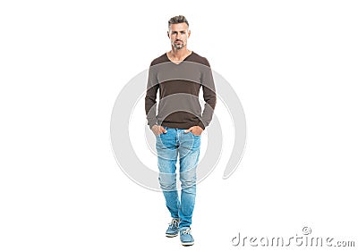 urban mature man in trendy menswear for everyday life. handsome man in a casual menswear in studio. well looking man in Stock Photo